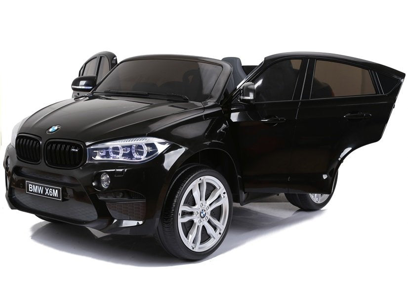 Licencirani auto na akumulator BMW X6M - dvosjed - crni/lakirani