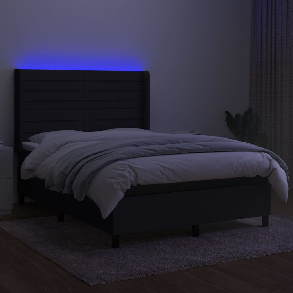 Krevet box spring s madracem LED crni 140x200 cm od tkanine