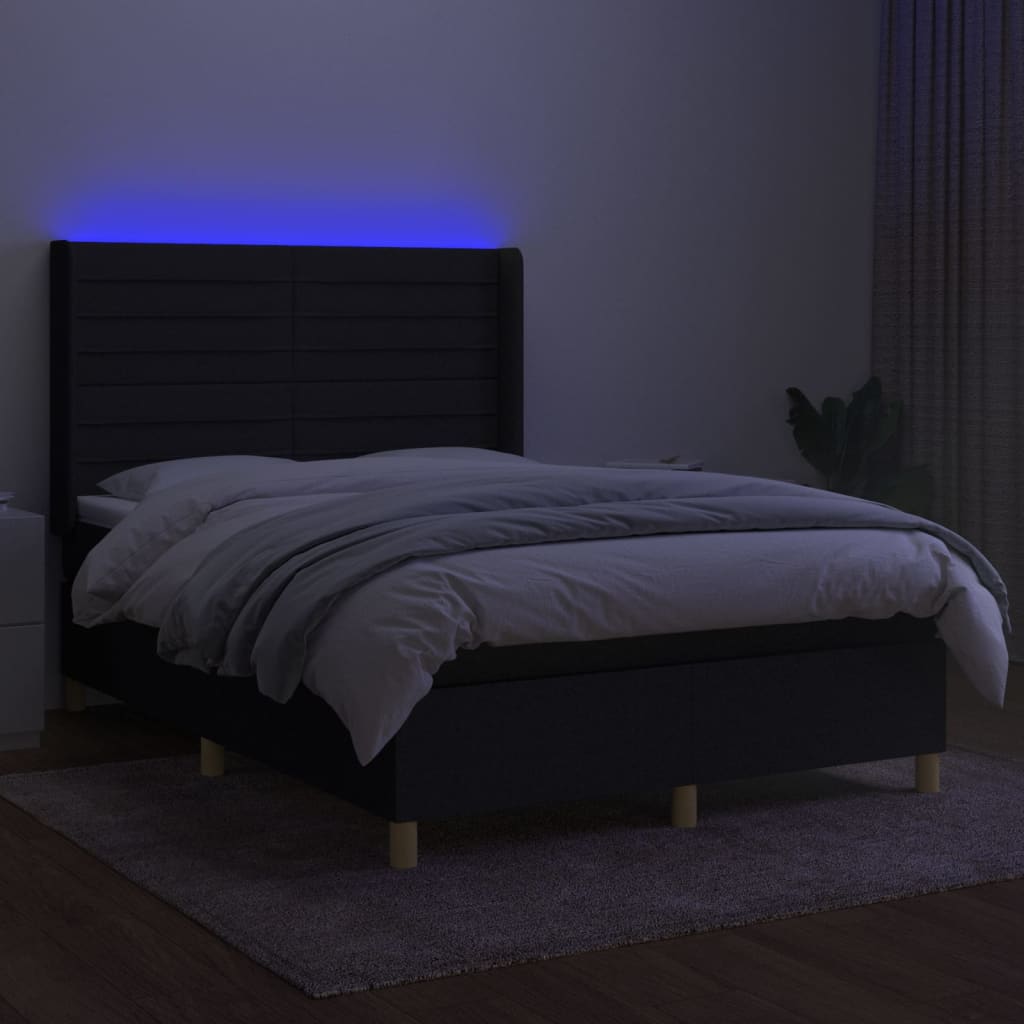 Krevet box spring s madracem LED crni 140x200 cm od tkanine