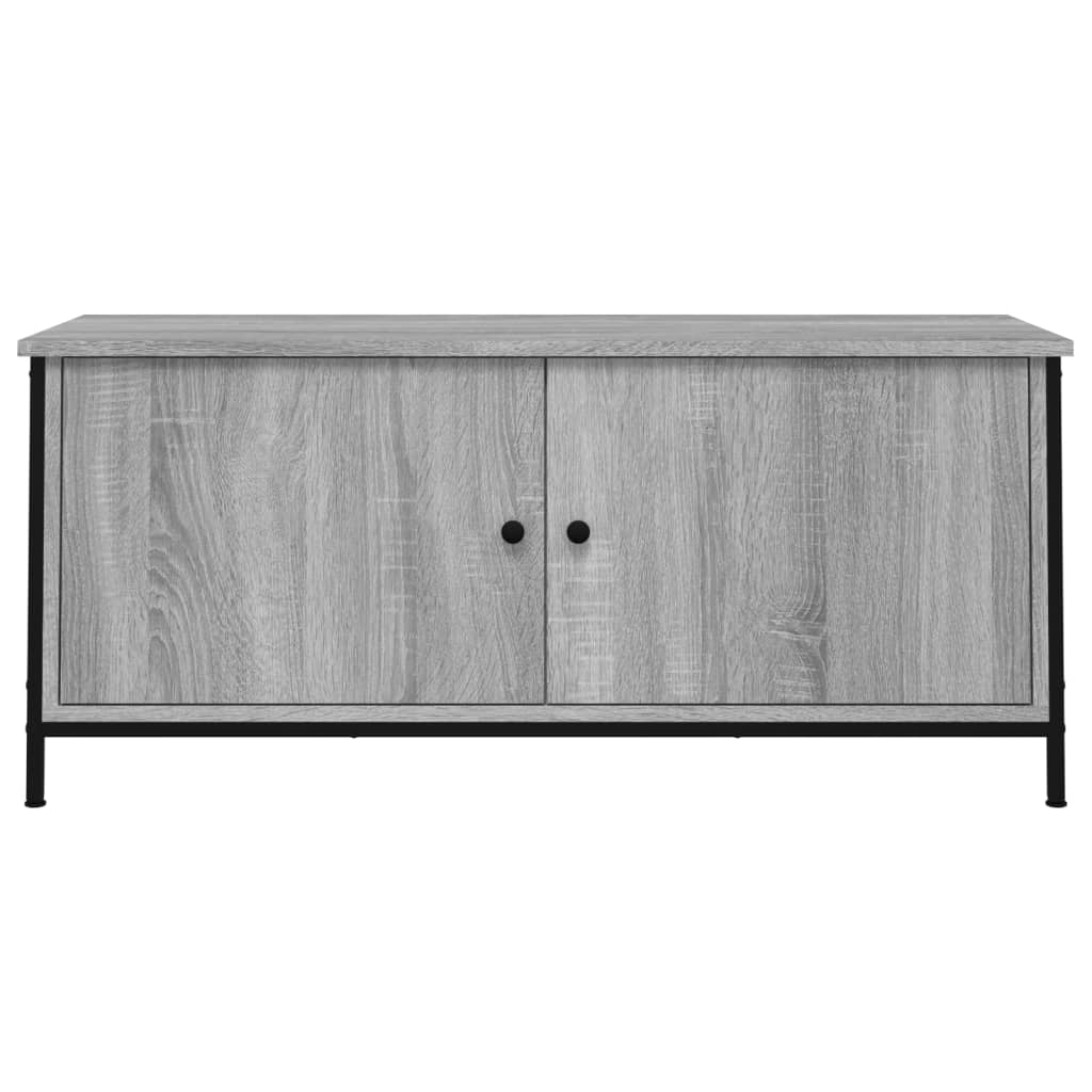TV ormarić s vratima boja hrasta 102x35x45 cm konstruirano drvo