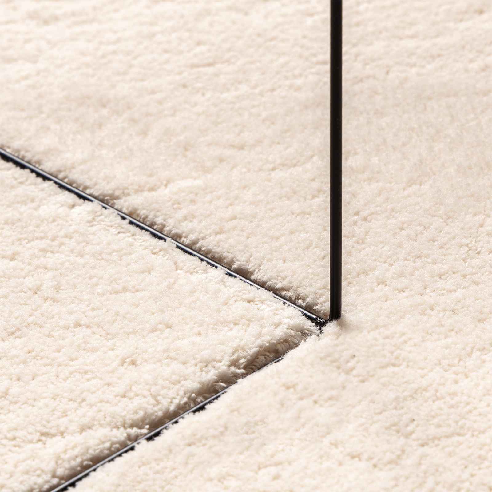 Srednje pahuljasti, mekana i periva prostirka HUARTE Bež